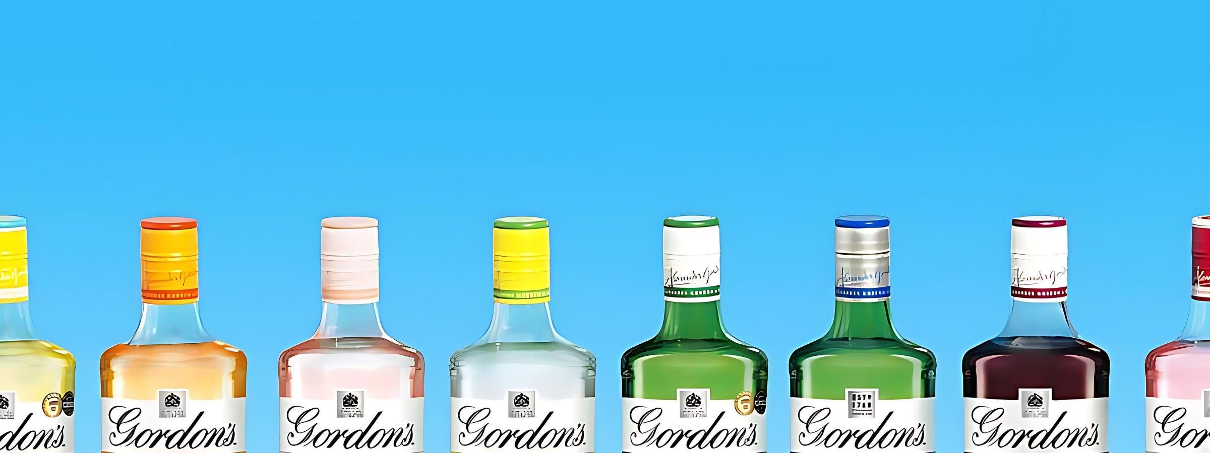 Gordon’s Gin branded alcohol bottles arranged for display