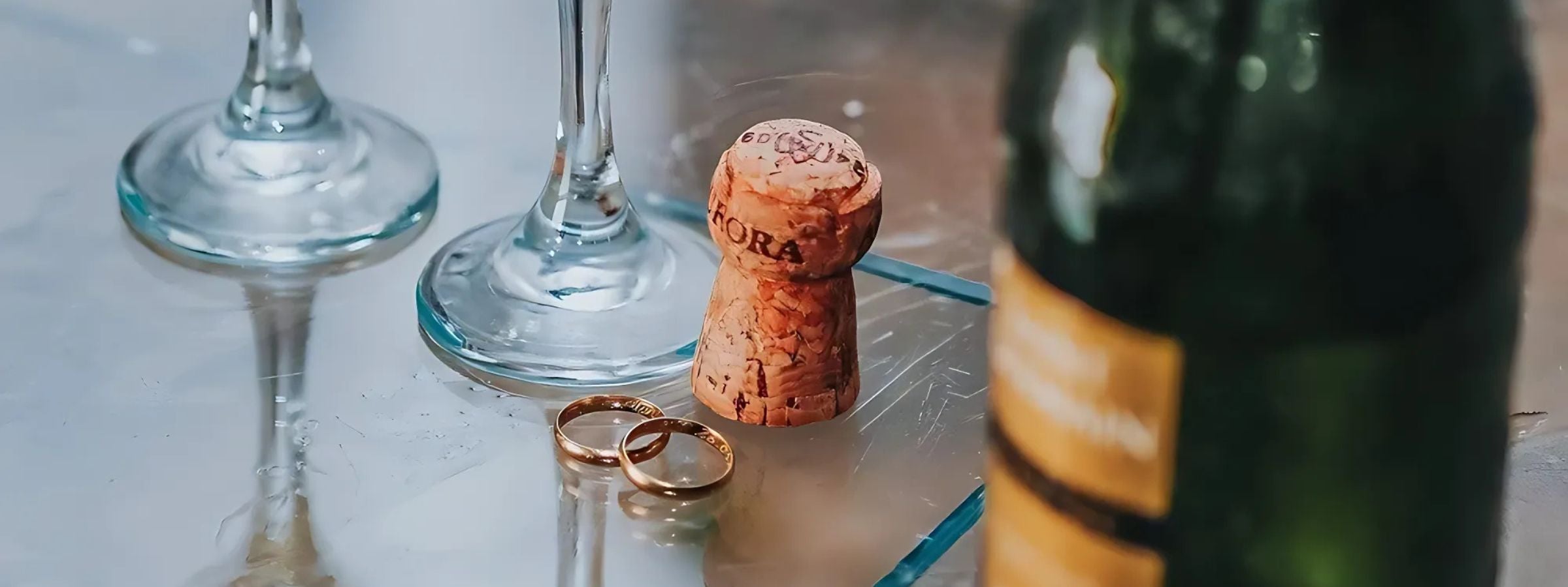 Selection of red, white, rosé and sparkling wine bottles with glasses and festive decor