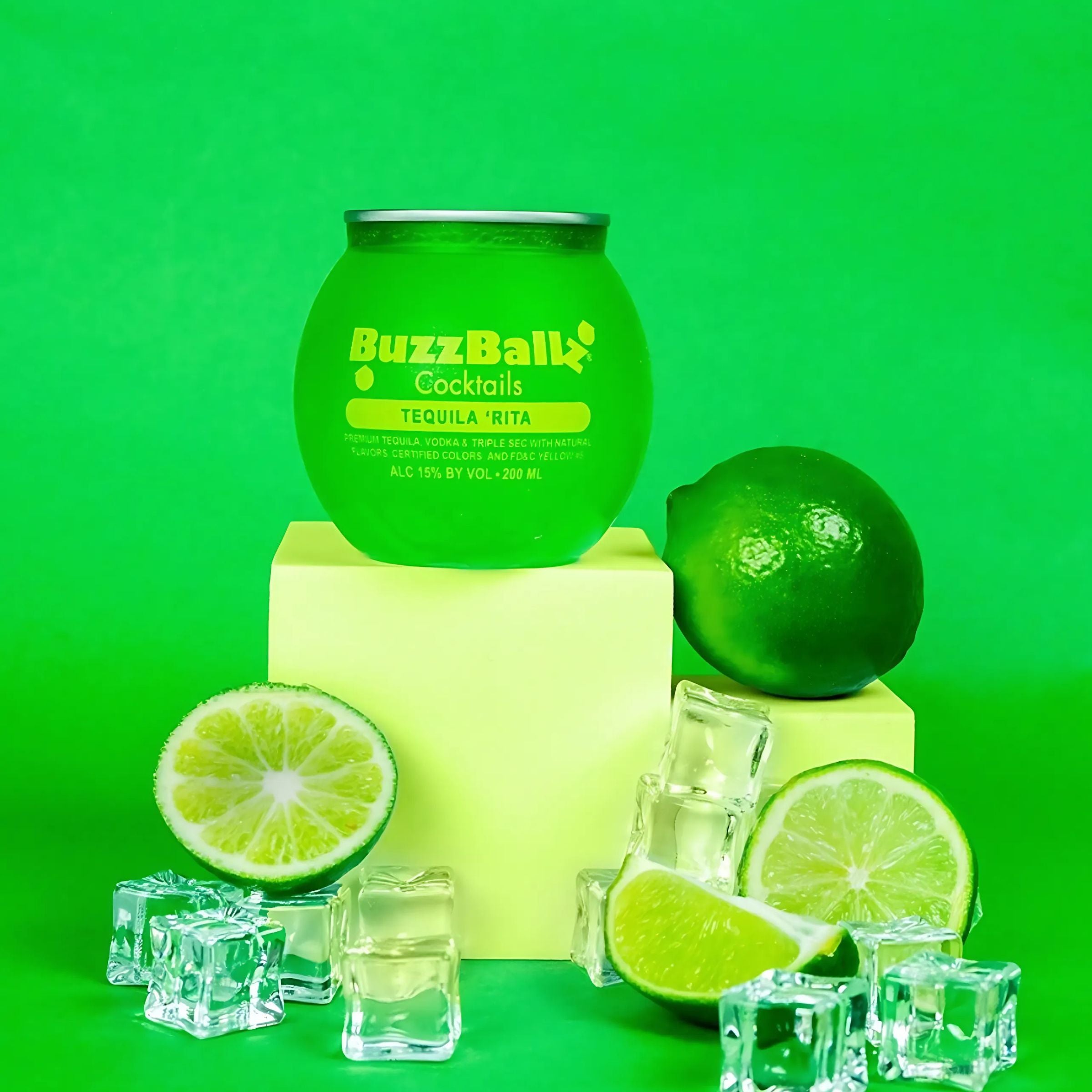 Green cocktail jar labeled 'BuzzBallz Cocktails' with limes and ice cubes on a green background