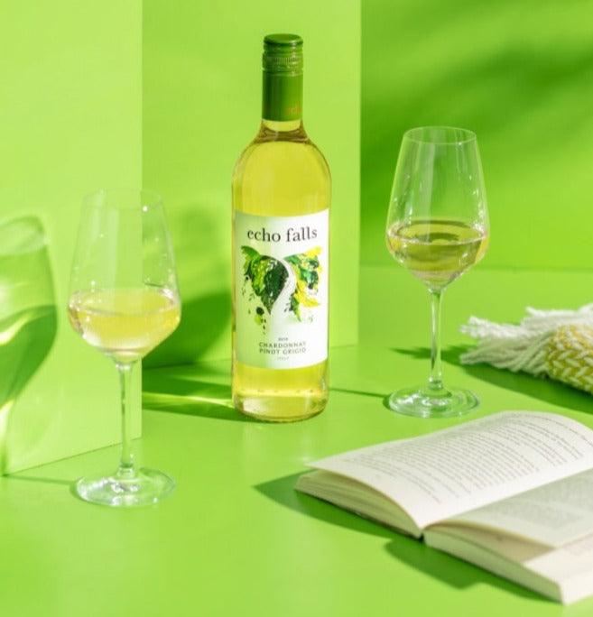 Echo Falls Chardonnay Pinot Grigio 75cl bottle with fruit and salad pairing on a bright tabletop