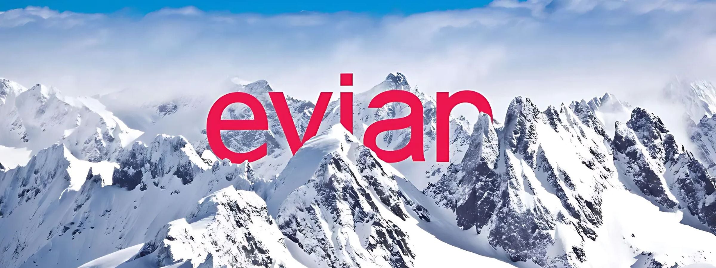 Evian-Natural-Mineral-Water branded bottles arranged for display