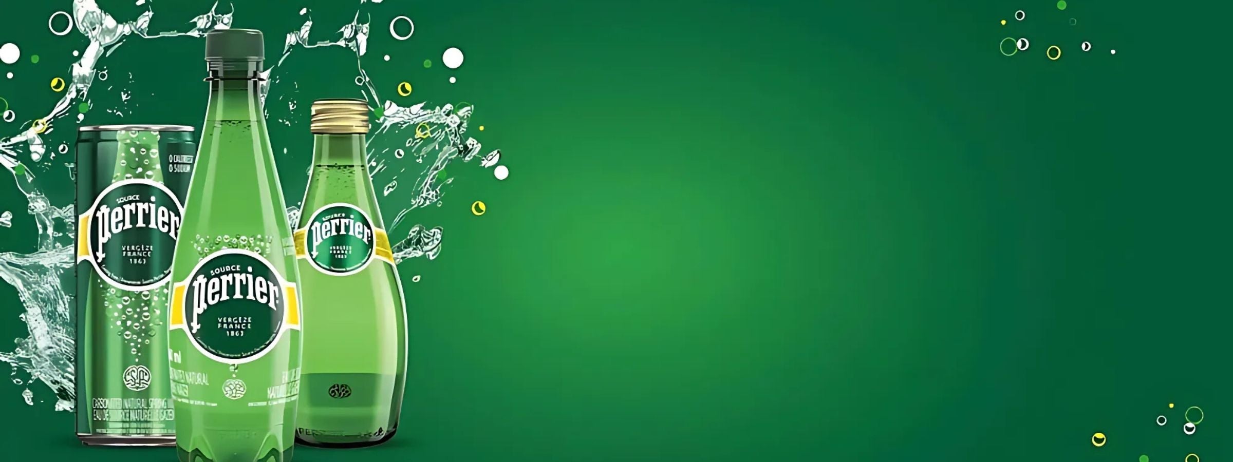 Perrier glass bottles and cans with fruit garnishes on a clean modern tabletop