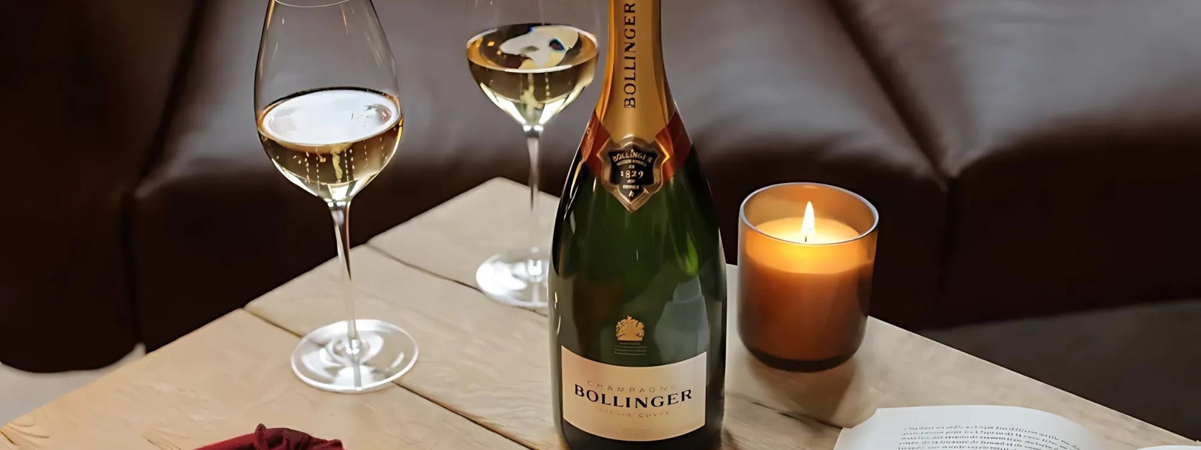 Champagne Bollinger branded alcohol bottles arranged for display