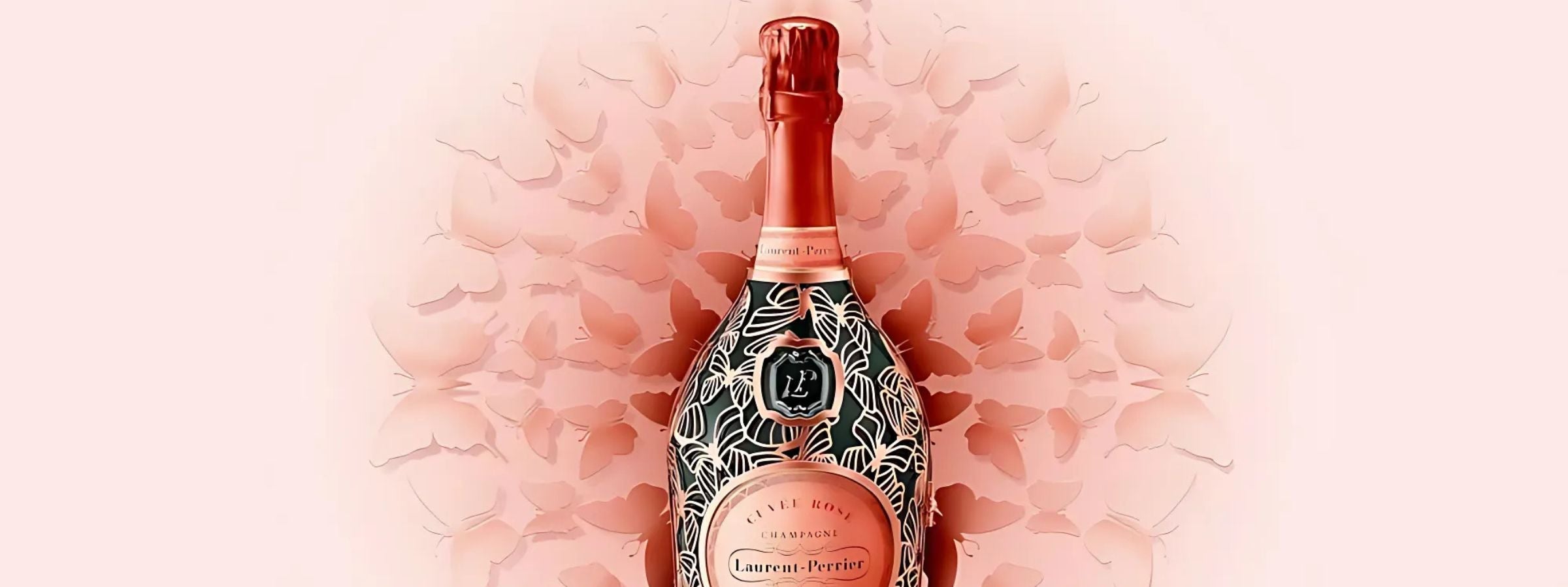 Laurent-Perrier champagne bottles with gold foil and elegant packaging